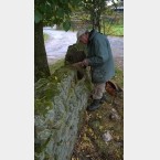 Chris repairing the wall alongside the car park in Bradfield